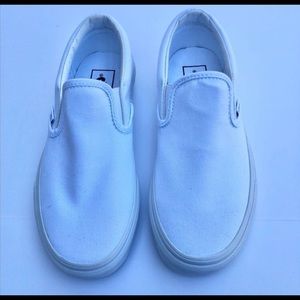 VANS slip-on sneakers. Size 6 women/4.5 men. NEVER WORN.